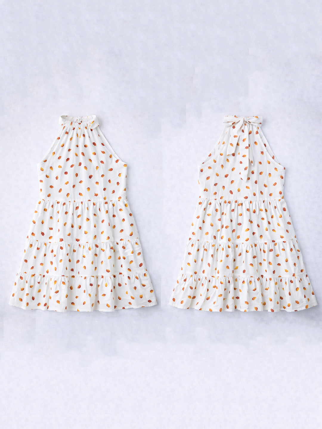 White Leaf Printed Cotton Blend Tiered Dress | Halter Neck Dress with Tie-Up Back